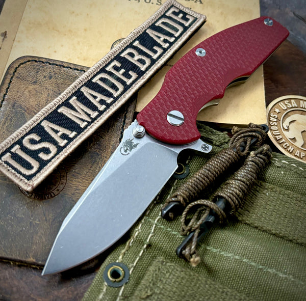 Hinderer Jurassic Hollow Ground Slicer Red G10 Bronze Ti Magnacut Stonewashed Blade