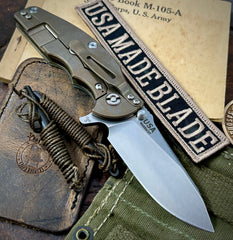 Hinderer Jurassic Hollow Ground Slicer Orange G10 Bronze Ti Magnacut Stonewashed Blade