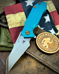 Caribbean Blue Wharnie Hinderer Half Track Gen 2 Textured Ti Anodized Stonewashed Presentation Side, Smooth Ti Lockside Magnacut Stonewashed Blade Bronzed Out HW