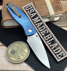 Carolina Blue TRM Neutron 2 Liner Lock with 3D Lizard Skin Titanium and Magnacut Steel Bronze Liners and Pocket Clip - USA MB