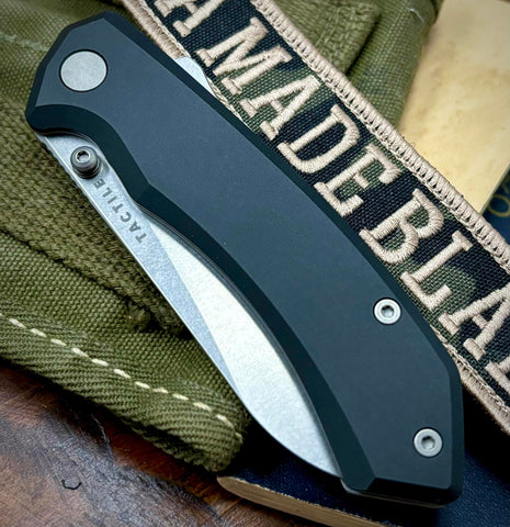 Chupacabra from Tactile Knife Company Tumbled Magnacut with Black Aluminum Scales with Ti Hardware