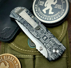 Defiant-7 Talos Button Lock Sasquatch Circuit with Magnacut Blade and Black Hardcoat Anodized Aluminum Handles - USA MB