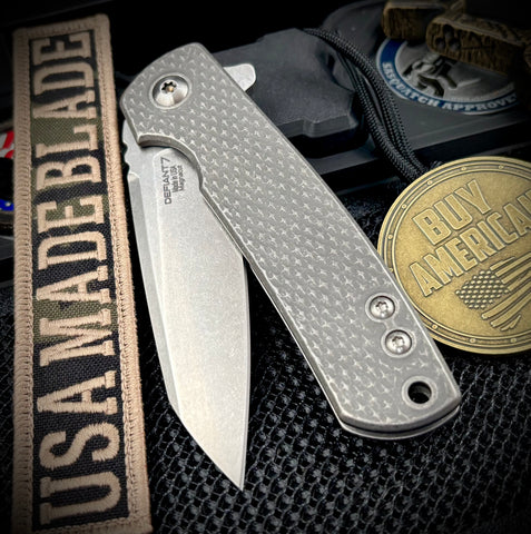 Defiant-7 Servo Diamond Textured Full Ti with Sheepsfoot Magnacut Blade