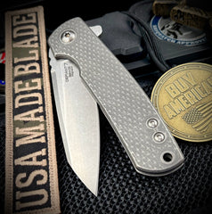 Defiant-7 Servo Diamond Textured Full Ti with Sheepsfoot Magnacut Blade