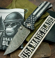 Battle Stars & Stripes Defiant-7 Talos Button Lock with Black Boomerang Stainless Chad Nichols Damascus Blade and Black Hardcoat Anodized Aluminum Handles