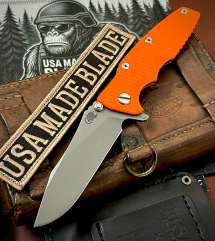 Hinderer Eklipse 3.5" Skinny Hollow Ground Slicer Orange G10 Battle Bronze Ti Working Finish Magnacut Blade - USA MB