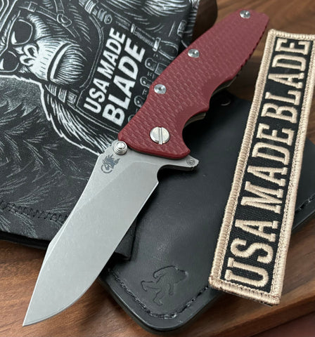 Hinderer Eklipse 3.5" Skinny Hollow Ground Slicer Red G10 Battle Bronze Ti Working Finish Magnacut Blade - USA MB