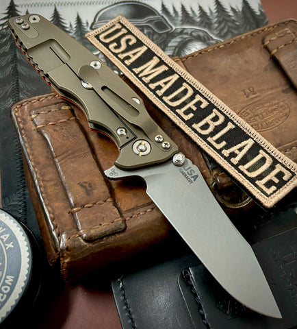 Hinderer Eklipse 3.5" Skinny Hollow Ground Slicer Orange G10 Battle Bronze Ti Working Finish Magnacut Blade - USA MB