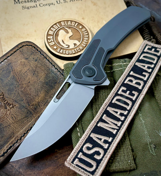 Archer from Tactile Knife Co. with Feathered Darkwash Ti, Distressed Ti inlay, Magnacut Blade and blackened ti hardware