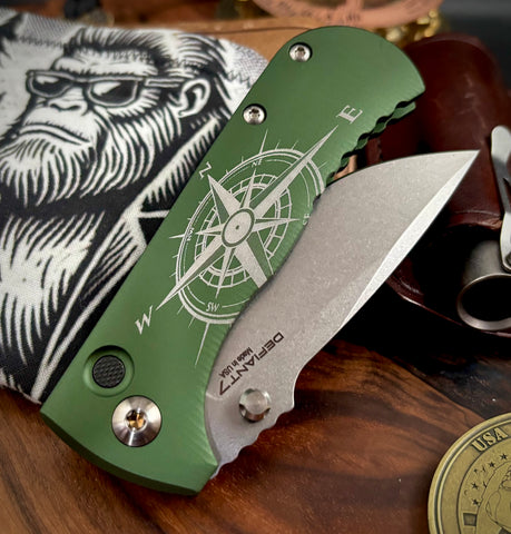 Squatchfinder Defiant-7 Talos Button Lock with Magnacut Blade and customized Green Hardcoat Anodized Aluminum Handles