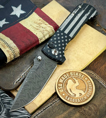 Battle Stars & Stripes Distressed Flag Defiant-7 Talos Button Lock with Black Boomerang Stainless Chad Nichols Damascus Blade and Black Hardcoat Anodized Aluminum Handles - USA MB