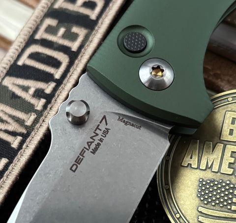 Defiant-7 Talos Button Lock with Magnacut Blade and Green Hardcoat Anodized Aluminum Handles