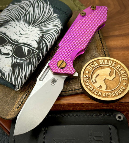 High Res Purple Slicer Hinderer Half Track Gen 2 Textured Ti Presentation Side, Smooth Ti Lockside Magnacut Stonewashed Blade with Bronzed Out HW