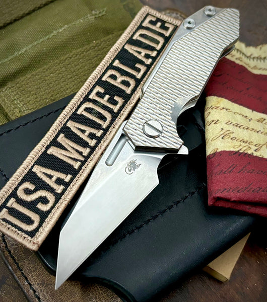 Wharnie Hinderer Half Track Gen 2 Textured Ti Stonewashed Presentation Side, Smooth Ti Lockside Magnacut Stonewashed Blade