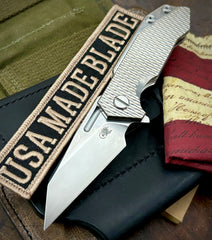 Wharnie Hinderer Half Track Gen 2 Textured Ti Stonewashed Presentation Side, Smooth Ti Lockside Magnacut Stonewashed Blade