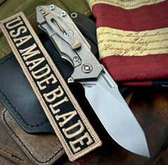 Slicer Hinderer Half Track Gen 2 Textured Ti Stonewashed Presentation Side, Smooth Ti Lockside Magnacut Stonewashed Blade