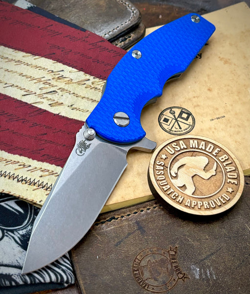 Hinderer Jurassic Slicer Blue G10 Working Finish Ti Magnacut Stonewashed Blade