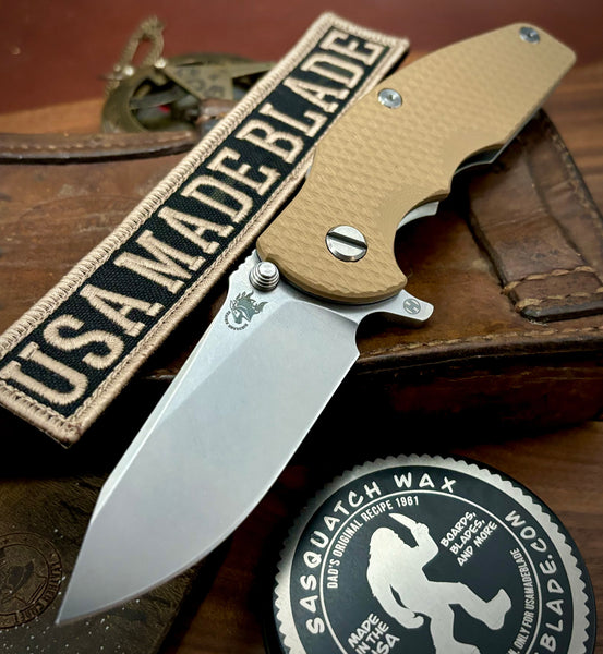Hinderer Jurassic Hollow Ground Slicer Coyote G10 Bronze Ti Magnacut Stonewashed Blade