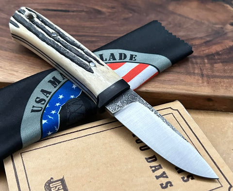 W.A. Surls Knives Notley Jigged Stag Bone Handles, Ground Black Canvas Guard, Tapered Tang and 1/8 A2 Hollow Ground Blade - USA MB