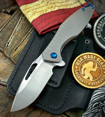Koenig Mini Arius with M390 Burnished Blade with Polished Flats Plexa Ti and Blue Ti Hardware