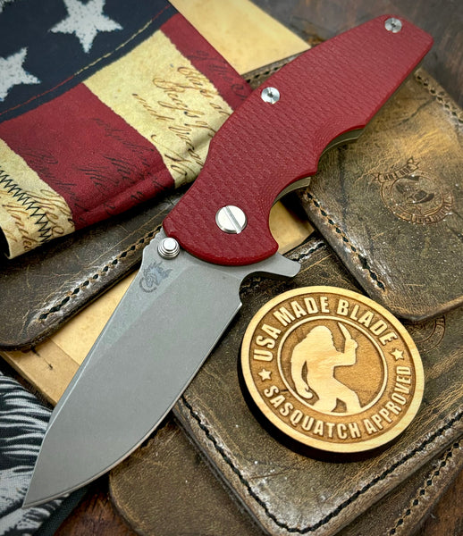 Hinderer Jurassic Slicer Red G10 Battle Bronze Ti Magnacut Working Finish Blade