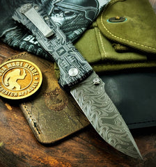 Circuit Squatch Defiant-7 Talos Button Lock with Black Boomerang Stainless Chad Nichols Damascus Blade and Black Hardcoat Anodized Aluminum Handles