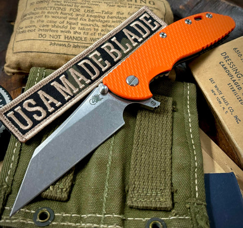 Hinderer XM-24 Skinny Wharncliffe Orange G10 Bronze Ti with S45VN Stonewashed Blade