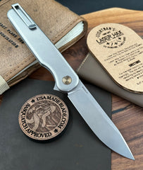 Rockwall Flipper with Stonewashed Magnacut Blade Countoured Ti Handles with Bronze Ti Hardware from Tactile Knife Co.