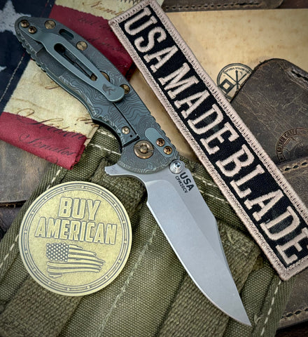 Topo Ammo Can Green Hinderer XM-18 3.0" Bowie Flipper Black G10 Anodized Working Finish Ti with Working Finish 20CV Blade Bronzed Out Hardware and Sasquatch Clip - USA MB