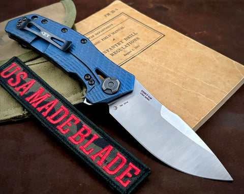 ZT0308CF Blue Anodized Ti Factory Special Series Satin Ground M390 Blade, Carbon Fiber Scale