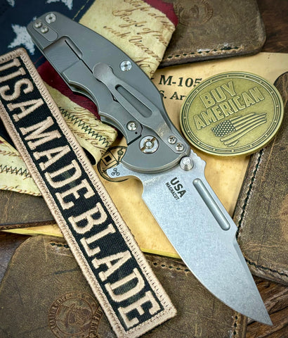 Hinderer Jurassic Slip Point Blue/Black G10 Working Finish Ti Magnacut Stonewashed Blade - USA MB