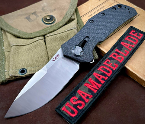 ZT0308CF Battled Green Anodized Ti Factory Special Series Satin Ground M390 Blade, Carbon Fiber Scale (Copy)