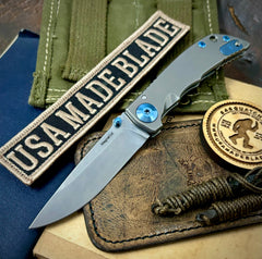 Spartan Harsey Folder 3.25 Stonewashed Magnacut Blade with Blue Anodized Hardware