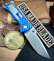 Defiant-7 Talos Button Lock Battled Stars & Stripes with Magnacut Blade and Blue Hardcoat Anodized Aluminum Handles